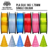 Six SpoolSpider PLA Silk 3D printer filament spools, 1kg, 1.75mm, in assorted colours, with matching printed Christmas trees.