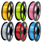 Six SpoolSpider PLA Silk 3D printer filament spools, 1kg, 1.75mm, in gold, green, pink, silver, red and blue.